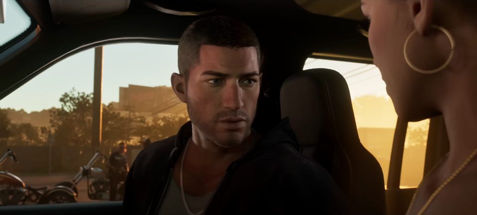 Jason Duval in golden-hour light, sitting in a car with Lucia
