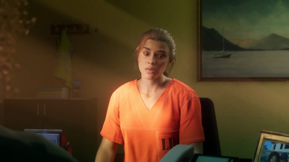 Lucia Caminos in an orange Leonida Penitentiary jumpsuit at her parole hearing