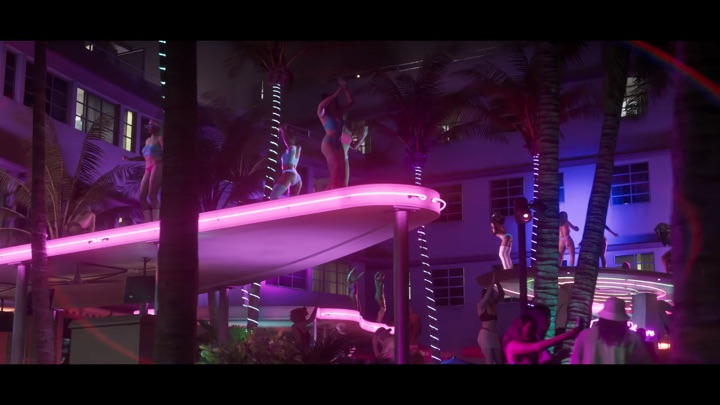 A neon-lit pool party at a Vice City hotel at night